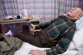 Canadian Healthcare / Toronto, Canada.

"I feel like a million bucks!", exclaims 82 year-old Ray Ashmore as he hurls himself on his bed after his successful carotid angioplasty. He is packed and ready to go home.