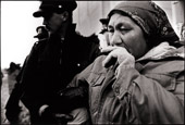 Ottawa, Canada. The Nation's Capital
Three days after her three month walk, Elizabeth Penashue is arrested for blocking employee access to the Department of National Defence Headquarters during a Remembrance Day civil disobedience action protesting low-level flight training over Nitassinan. Copyright Peter Sibbald, 1990.